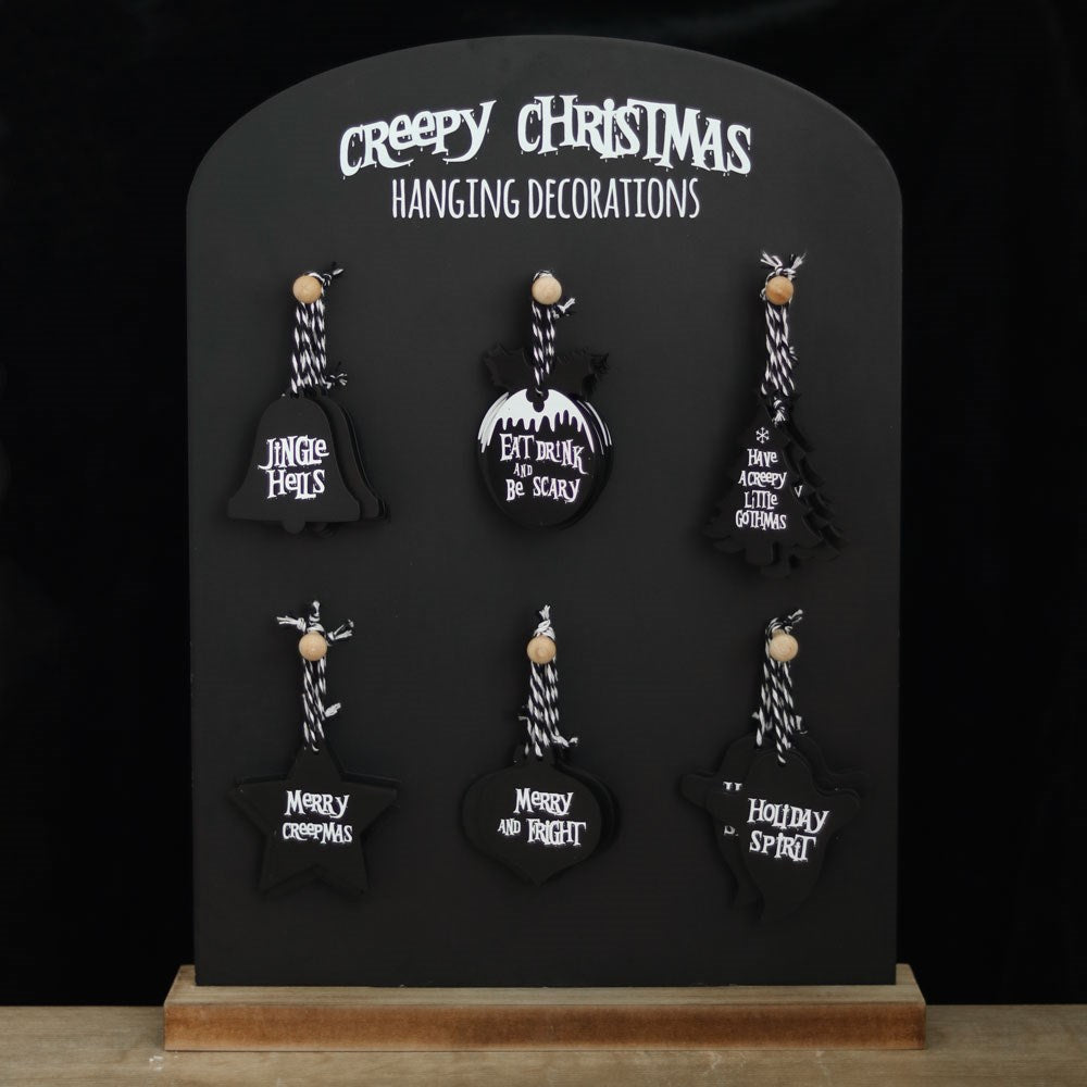 Set of 36 Creepy Christmas Hanging Signs on Display