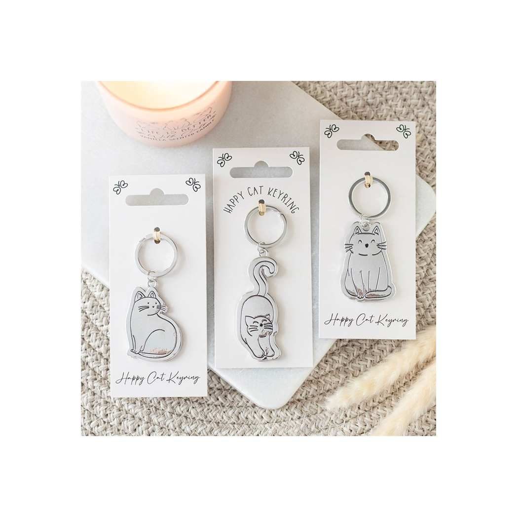 Set of 24 Happy Cat Keyrings on Display