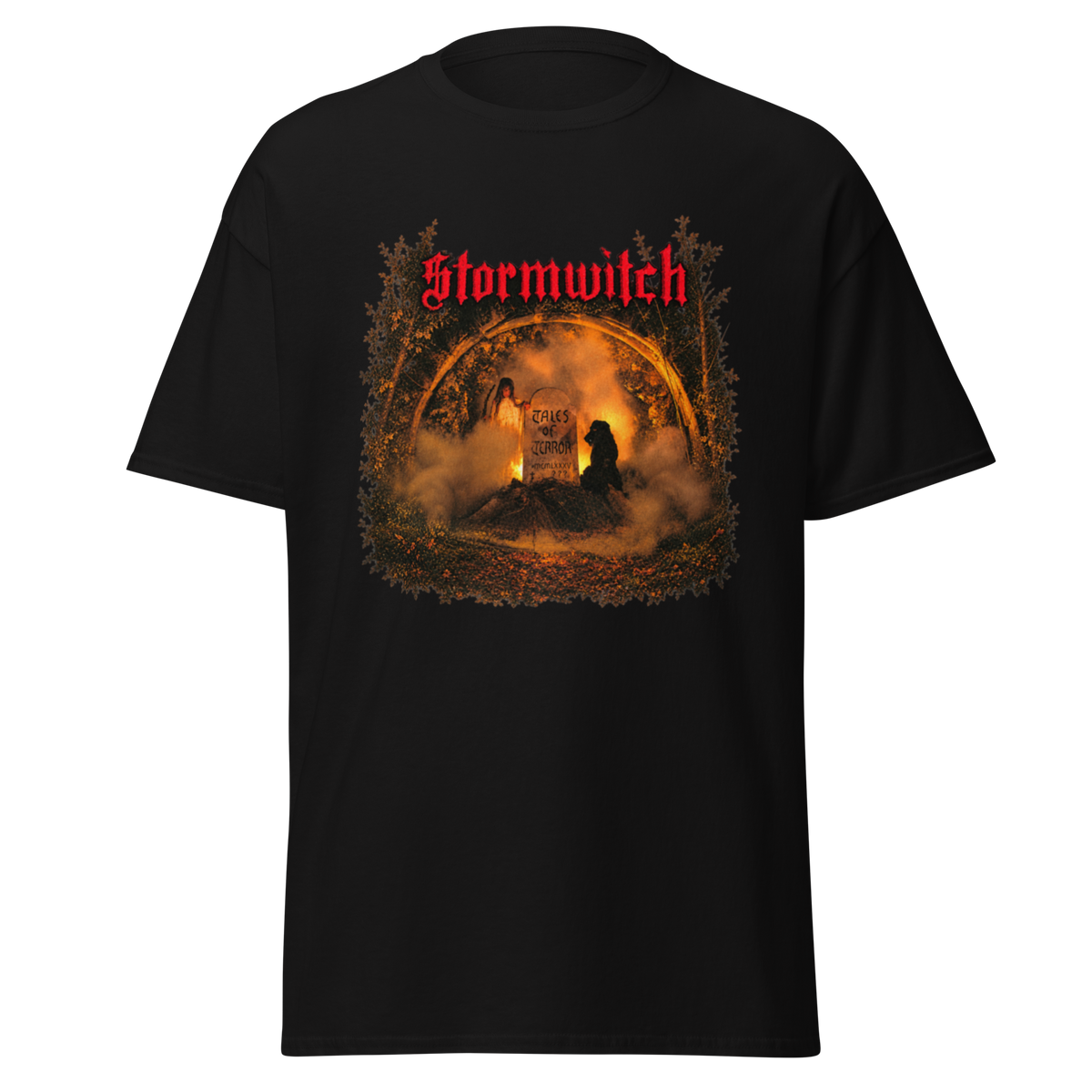 A black short-sleeve graphic t-shirt featuring the band name 'Stormwitch' in red gothic lettering above a circular, fiery, and smoky illustration with a dark figure silhouette.