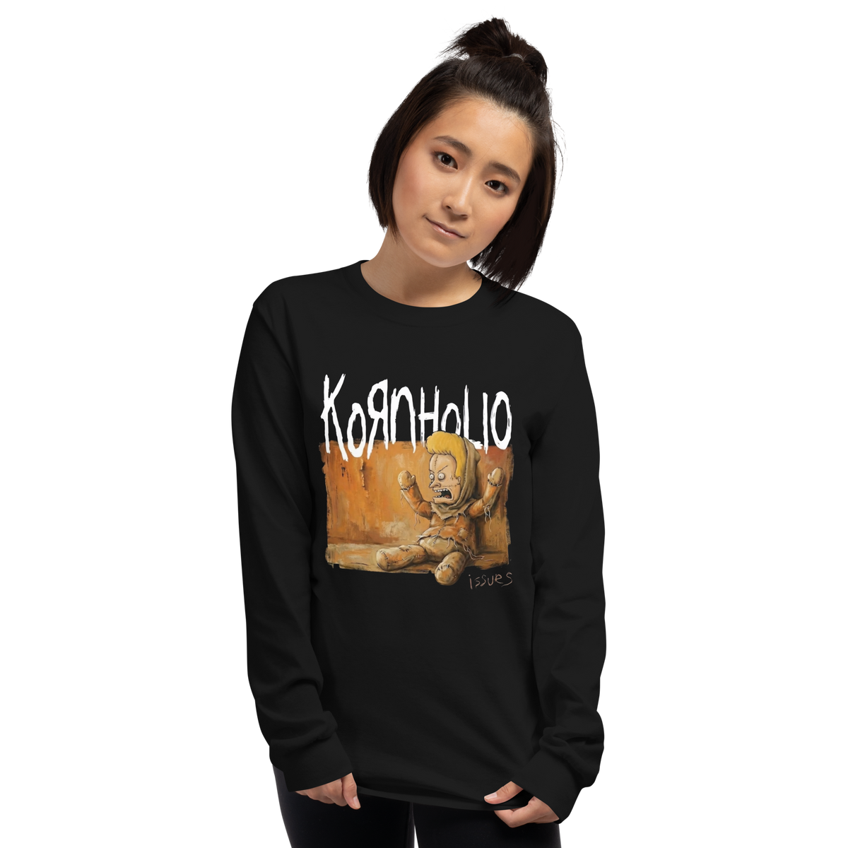 A woman modeling a black long-sleeve crewneck sweatshirt featuring a graphic print of a teddy bear and the Kornhole logo.
