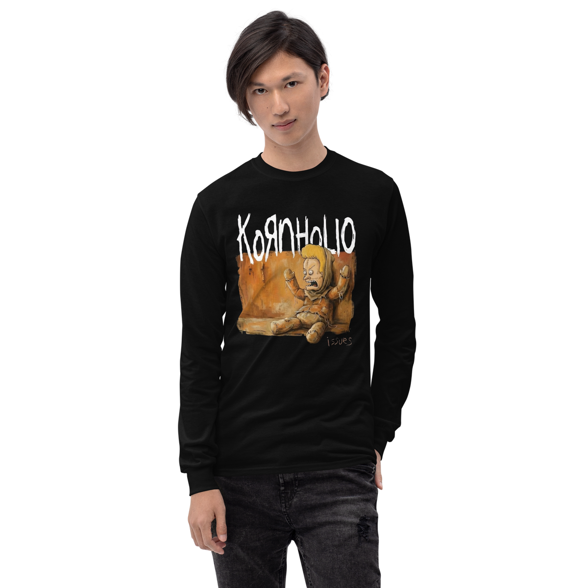 A man wearing a black long-sleeve t-shirt with a graphic print of a teddy bear and the word 'Kornhole' on the front, paired with dark gray jeans, against a plain white background.